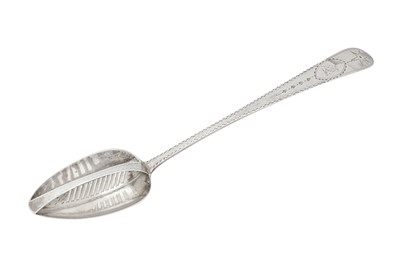 Lot 307 - A George III Irish sterling silver straining spoon, Dublin 1799 by John Pittar