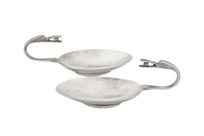 Lot 358 - A pair of George VI Scottish silver Traprain treasure dishes, Edinburgh 1938 by Brook and Sons