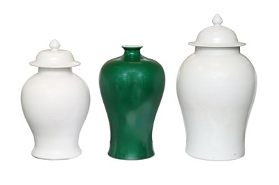 Lot 1388 - TWO CHINESE WHITE JARS AND COVERS AND A GREEN VASE, 20TH CENTURY