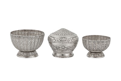 Lot 152 - An early 20th century Thai unmarked silver group of betel set vessels, circa 1920