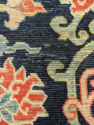 Lot 82 - A TIBETAN WOOL 'LOTUS' SLEEPING RUG, KHADEN