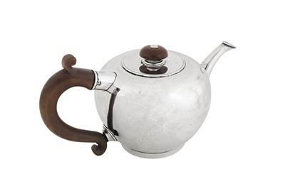 Lot 452 - A rare George I provincial sterling silver 'bullet' teapot, Exeter 1725 by Joseph Collier of Plymouth