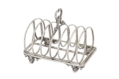 Lot 395 - A Victorian sterling silver seven bar toast rack, London 1843 by messrs Barnard