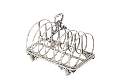 Lot 395 - A Victorian sterling silver seven bar toast rack, London 1843 by messrs Barnard
