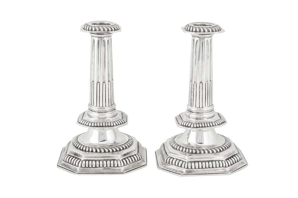 Lot 401 - A pair of Victorian sterling silver candlesticks, London 1875 by John Henry Williamson