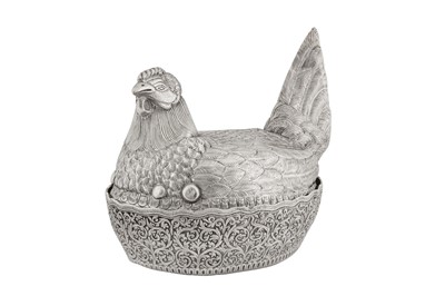 Lot 144 - A rare early 20th century Burmese silver novelty 'hen on nest' egg cruet, Shan States dated 1904