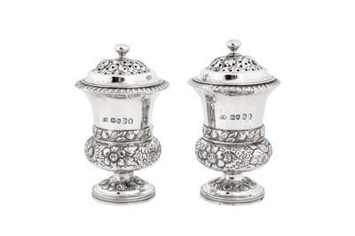 Lot 421 - A pair of George IV sterling silver pepper casters, London 1824 by Thomas Wilkes Barker