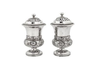 Lot 421 - A pair of George IV sterling silver pepper casters, London 1824 by Thomas Wilkes Barker