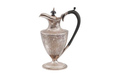 Lot 1182 - A George V sterling silver hot water pot, Sheffield 1919 by James Deakin & Sons
