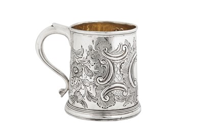 Lot 523 - A Queen Anne / George I Britannia standard silver mug, London circa 1715, maker’s mark obliterated