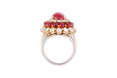 Lot 35 - A CABOCHON RUBY AND DIAMOND CLUSTER RING