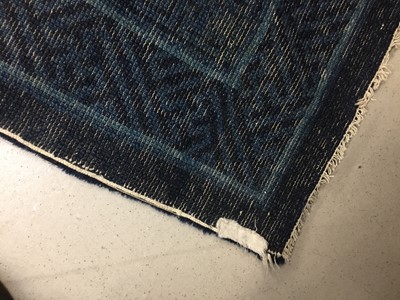 Lot 86 - A CHINESE BLUE-GROUND 'FLOWERS' CARPET