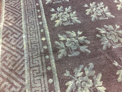 Lot 86 - A CHINESE BLUE-GROUND 'FLOWERS' CARPET