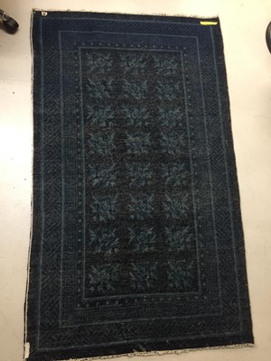 Lot 86 - A CHINESE BLUE-GROUND 'FLOWERS' CARPET