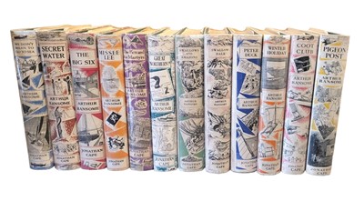 Lot 338 - Ransome 'Swallows & Amazons' 12 titles. 1932-47