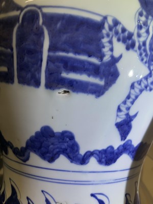 Lot 608 - A CHINESE BLUE AND WHITE 'QILIN' BALUSTER VASE