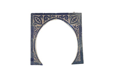 Lot 470 - AN OGIVAL ARCH OF MARINID TERRACOTTA TILES