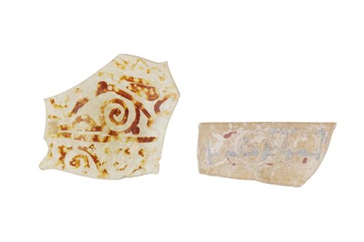 Lot 108 - TWO EARLY ISLAMIC GLASS FRAGMENTS