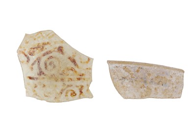 Lot 108 - TWO EARLY ISLAMIC GLASS FRAGMENTS