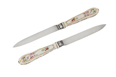 Lot 259 - A pair of Louis XVI late 18th century French provincial silver and Nymphenburg porcelain handled dessert knives, Nancy 1778-82, cutlers mark of a crowned heart (untraced)