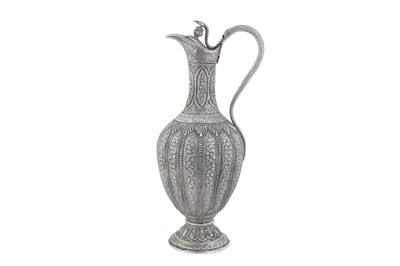 Lot 102 - A late 19th century Anglo – Indian silver-plated copper claret jug, Kashmir circa 1880
