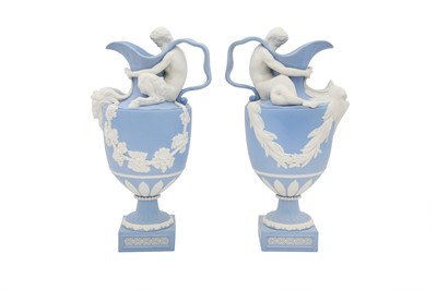 Lot 1568 - A PAIR OF 20TH-CENTURY WEDGWOOD JASPERWARE WATER AND WINE EWERS