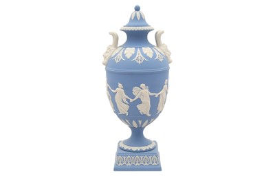 Lot 1569 - A 20TH-CENTURY WEDGWOOD JASPERWARE DANCING HOURS TWIN-HANDLED URN