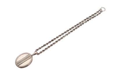 Lot 1031 - A SILVER LOCKET