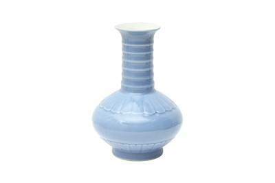 Lot 887 - A CHINESE MONOCHROME BLUE-GLAZED 'PETAL' VASE