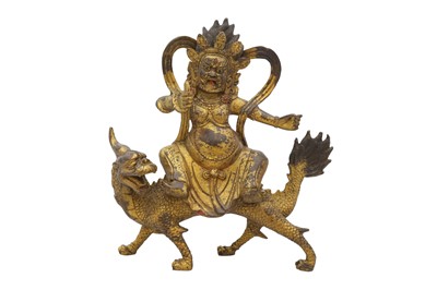 Lot 1395 - A TIBETAN GILT-BRONZE FIGURE OF A DEITY, 20TH CENTURY