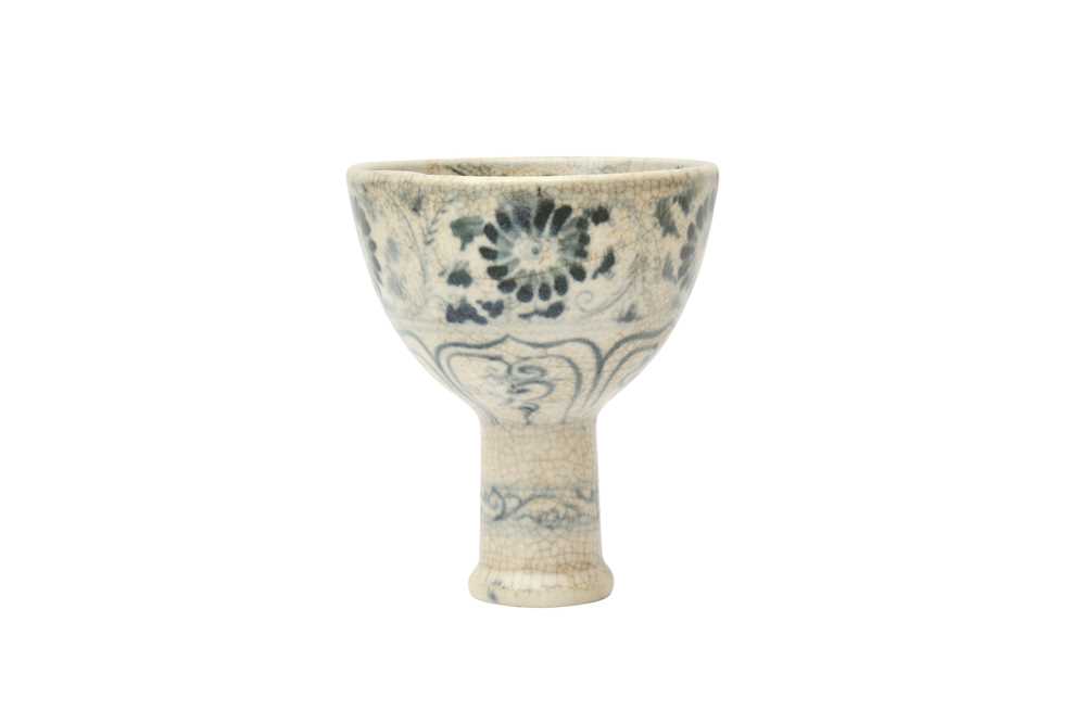 Lot 788 - A RARE VIETNAMESE BLUE AND WHITE 'FLOWERS' STEM CUP