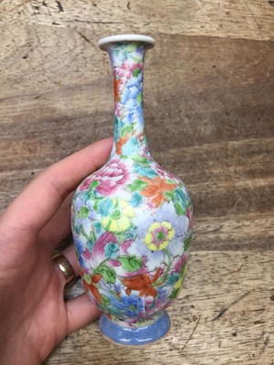 Lot 636 - A SMALL CHINESE FAMILLE-ROSE 'MILLEFLEURS' VASE