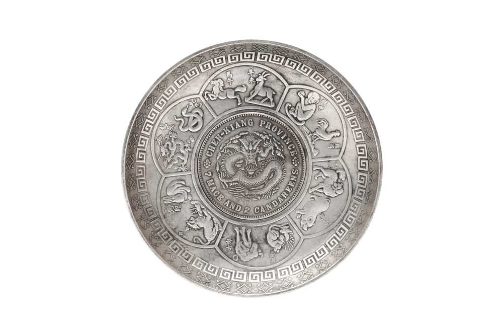 Lot 699 - A CHINESE WHITE-METAL 'ZODIAC' DISH