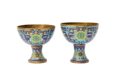 Lot 701 - TWO CHINESE GILT-BRONZE CLOISONNÉ STEM CUPS