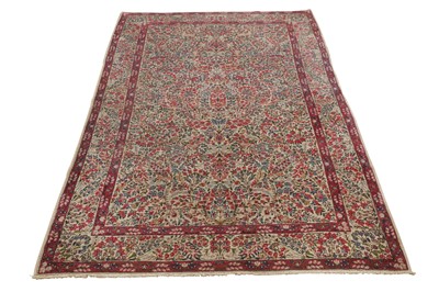 Lot 44 - AN ANTIQUE KIRMAN LAVER RUG, SOUTH PERSIA