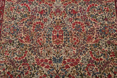 Lot 44 - AN ANTIQUE KIRMAN LAVER RUG, SOUTH PERSIA