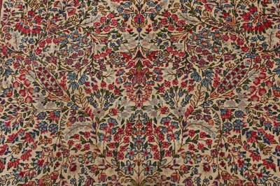 Lot 44 - AN ANTIQUE KIRMAN LAVER RUG, SOUTH PERSIA