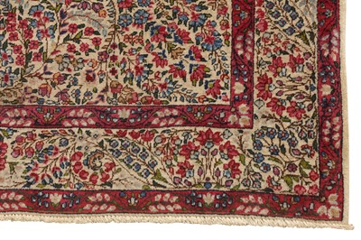 Lot 44 - AN ANTIQUE KIRMAN LAVER RUG, SOUTH PERSIA