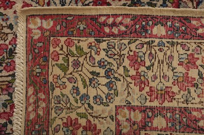 Lot 44 - AN ANTIQUE KIRMAN LAVER RUG, SOUTH PERSIA