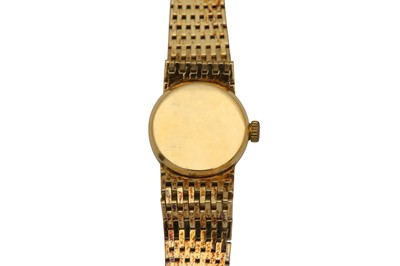 Lot 1116 - A LADIES 14K GOLD TISSOT BRACELET WATCH