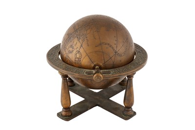 Lot 238 - AN ENGRAVED BRASS ISLAMIC CELESTIAL GLOBE