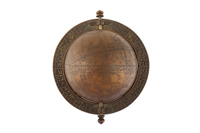 Lot 238 - AN ENGRAVED BRASS ISLAMIC CELESTIAL GLOBE