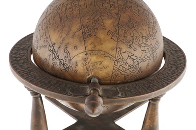 Lot 238 - AN ENGRAVED BRASS ISLAMIC CELESTIAL GLOBE