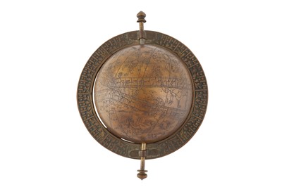 Lot 238 - AN ENGRAVED BRASS ISLAMIC CELESTIAL GLOBE