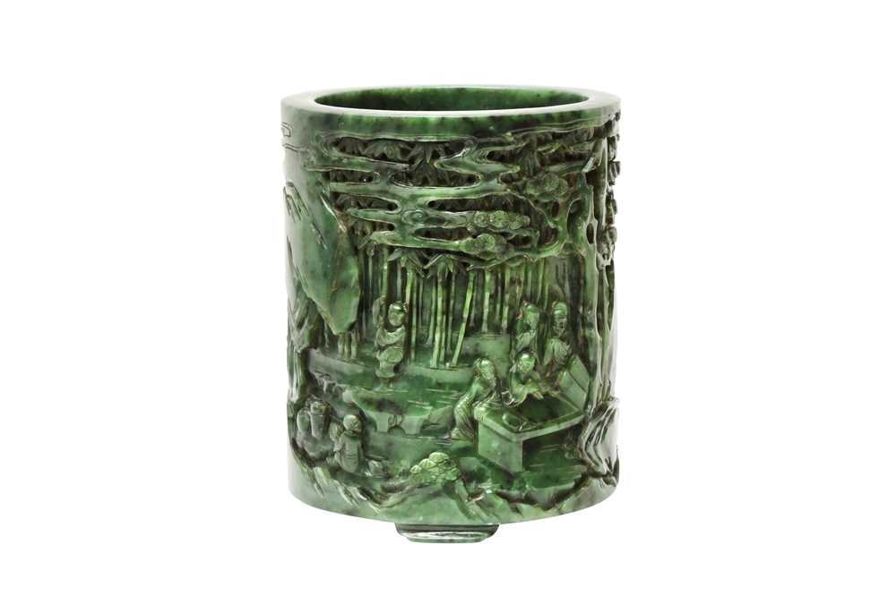 Lot 58 - A CHINESE SPINACH-GREEN JADE 'SEVEN SAGES' BRUSH POT, BITONG