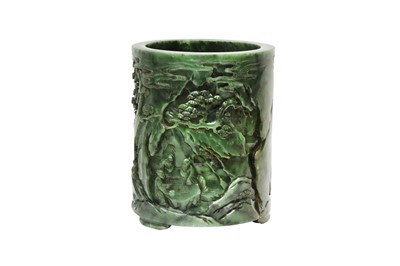 Lot 58 - A CHINESE SPINACH-GREEN JADE 'SEVEN SAGES' BRUSH POT, BITONG