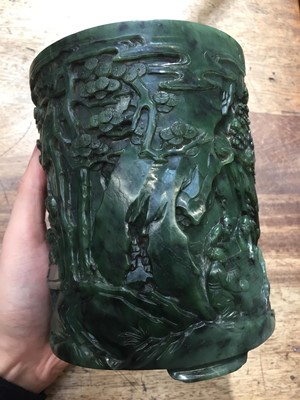 Lot 58 - A CHINESE SPINACH-GREEN JADE 'SEVEN SAGES' BRUSH POT, BITONG