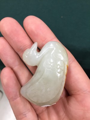 Lot 585 - A CHINESE CELADON JADE CARVING OF A DUCK