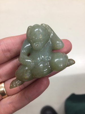 Lot 589 - A CHINESE CELADON JADE CARVING OF A BEAR