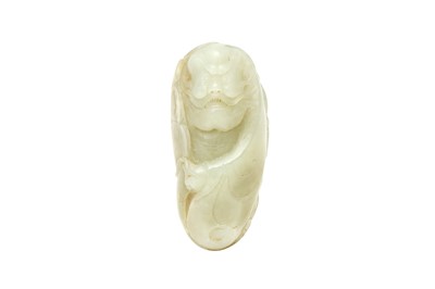 Lot 427 - A CHINESE CELADON JADE CARVING OF A BODHIDHARMA